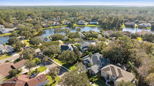 133 Sawmill Lakes Blvd, Ponte Vedra Beach, FL 32082 - aerial view of property and surrounding area featuring nearby suburban area, a forest, and a large body of water