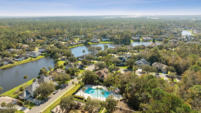 133 Sawmill Lakes Blvd, Ponte Vedra Beach, FL 32082 - aerial view of residential area with a heavily wooded area, a nearby body of water, and a pool area