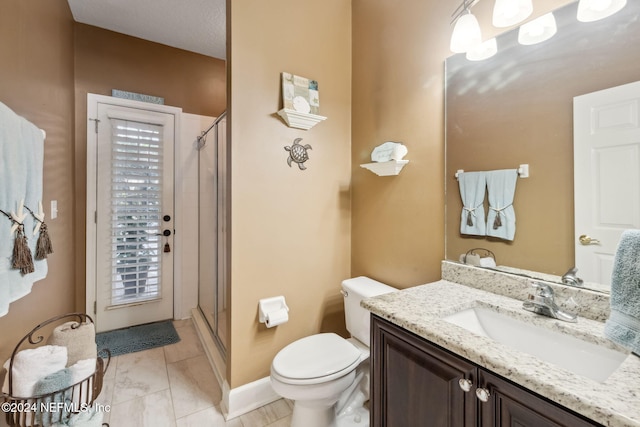 133 Sawmill Lakes Blvd, Ponte Vedra Beach, FL 32082 - bathroom featuring vanity, a shower stall, toilet, and baseboards
