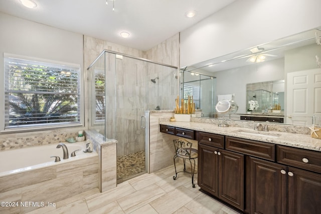 133 Sawmill Lakes Blvd, Ponte Vedra Beach, FL 32082 - bathroom with a bath, vanity, a stall shower, and ceiling fan