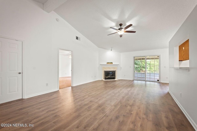 unfurnished living room with ceiling fan, high vaulted ceiling, beamed ceiling, and wood-type flooring