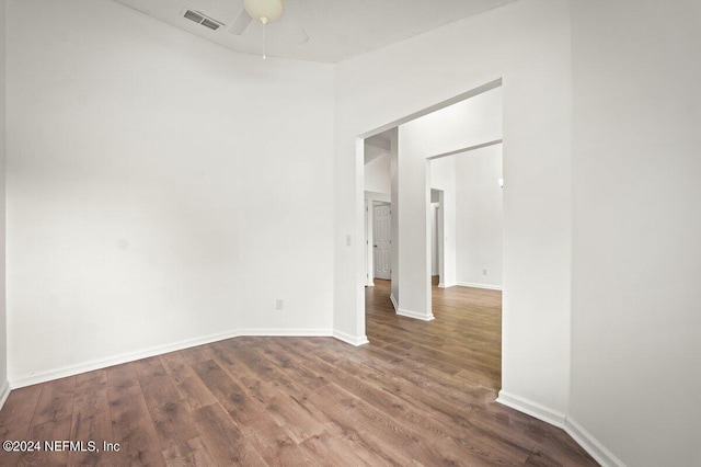 spare room featuring ceiling fan and hardwood / wood-style flooring