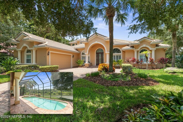 view of front of property with a garage