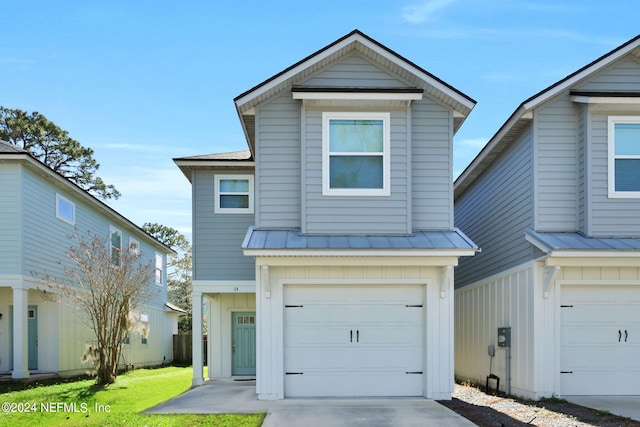 front of property featuring a garage