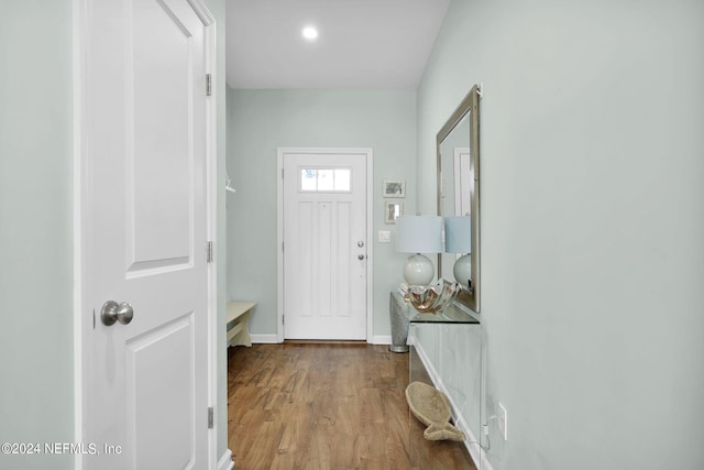 doorway to outside with hardwood / wood-style floors