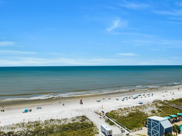 view of water feature with a beach view