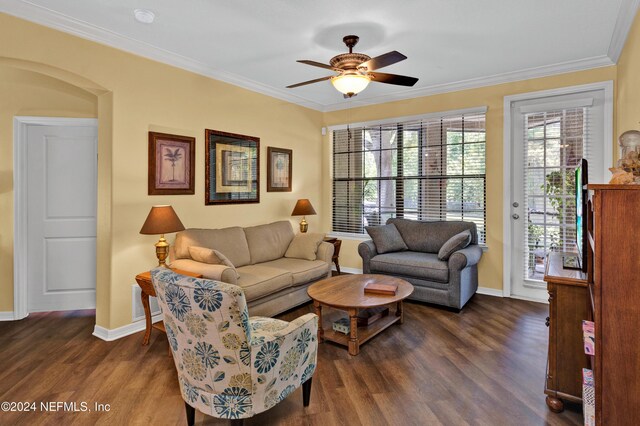 living room featuring ornamental molding, hardwood / wood-style flooring, and ceiling fan