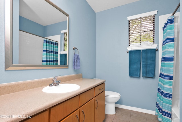 bathroom with tile patterned flooring, toilet, vanity, baseboards, and a shower with curtain