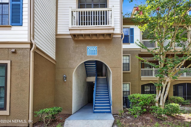 view of property with stairway