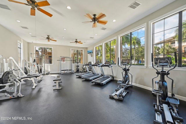 gym featuring baseboards, visible vents, and recessed lighting