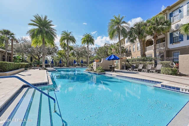 community pool featuring a patio