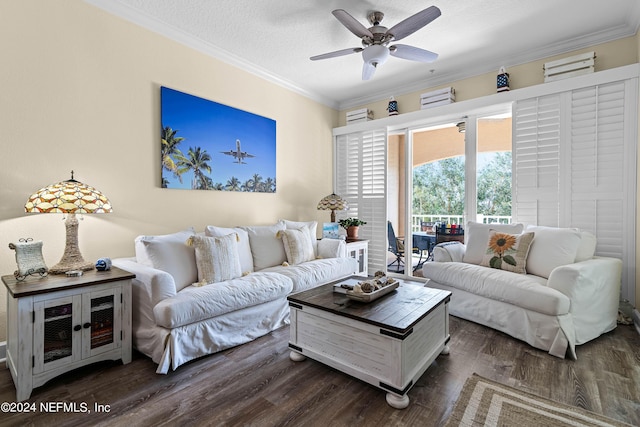 living room with ceiling fan, a textured ceiling, dark wood finished floors, and crown molding