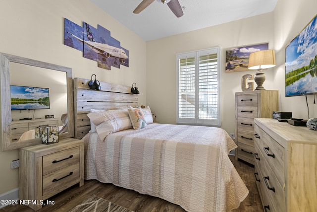 bedroom featuring ceiling fan and dark wood finished floors