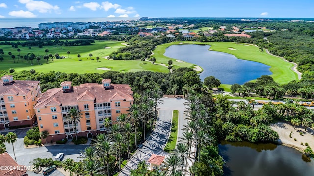 drone / aerial view featuring a water view and golf course view