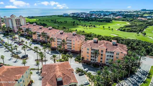 birds eye view of property featuring a water view and golf course view