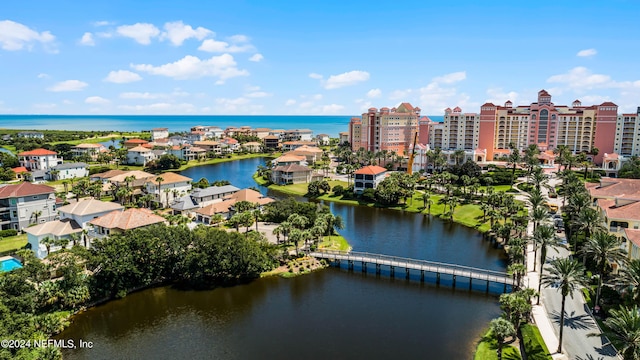 aerial view with a water view and a view of city