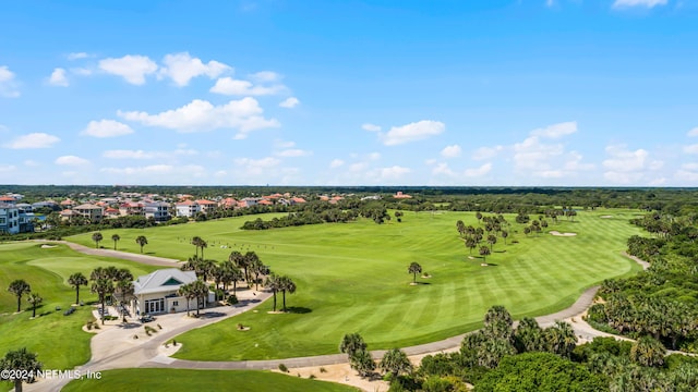 bird's eye view with view of golf course