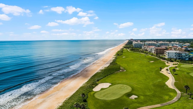 aerial view featuring a water view and a view of the beach