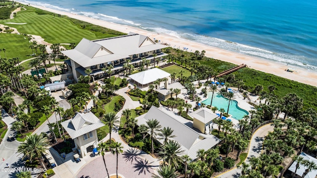 birds eye view of property with a view of the beach and a water view