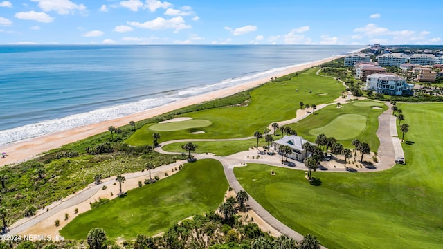 bird's eye view with a beach view and a water view