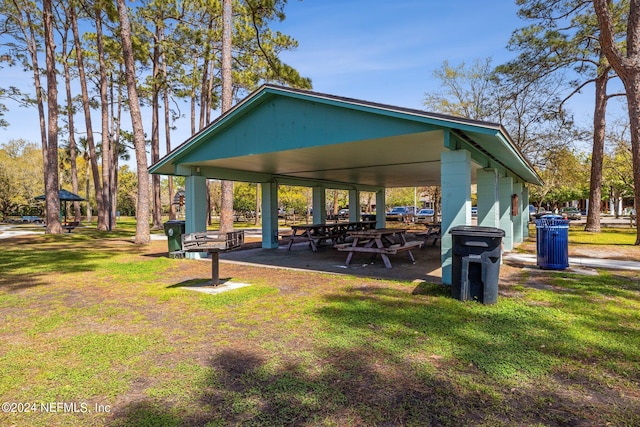 surrounding community featuring a lawn and a gazebo