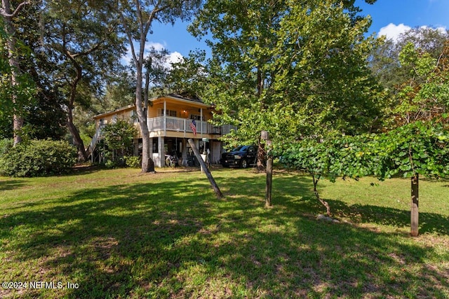 view of yard with a deck