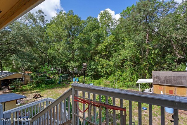 wooden balcony featuring a wooden deck