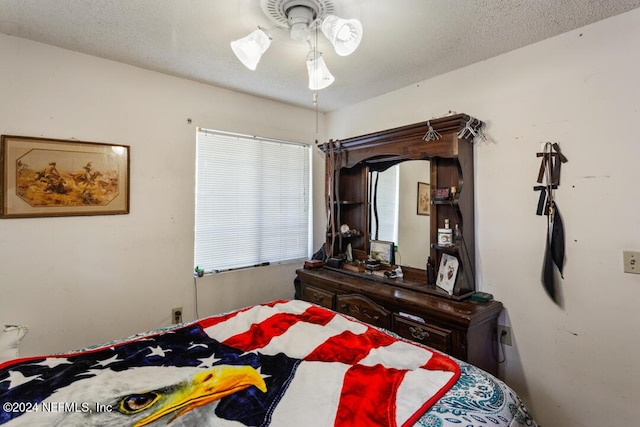 bedroom featuring a textured ceiling