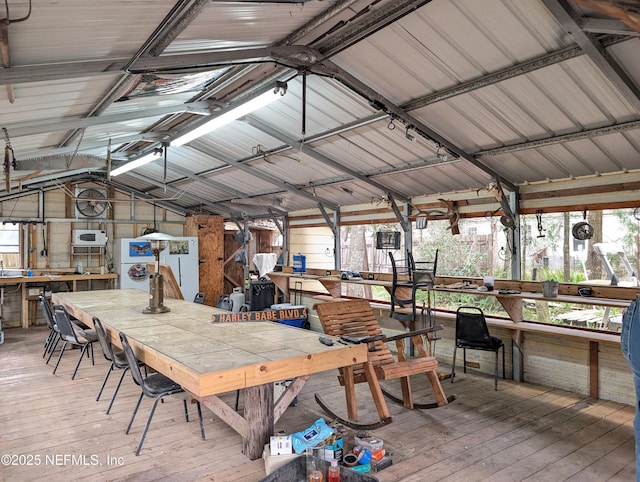 view of patio featuring a wooden deck and outdoor dining space