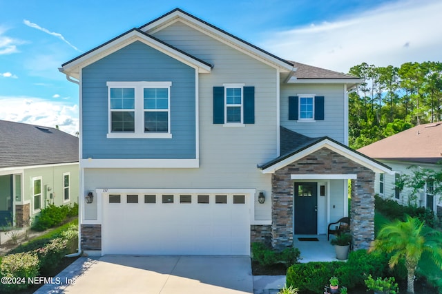 view of front of home with a garage