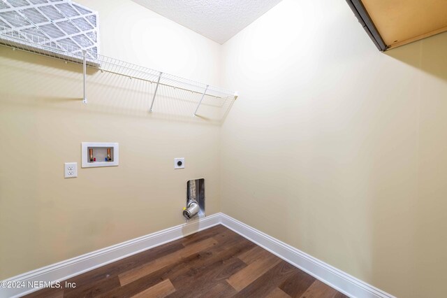 laundry room with washer hookup, electric dryer hookup, and hardwood / wood-style flooring