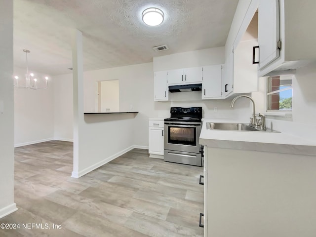 kitchen with white cabinetry, sink, an inviting chandelier, and stainless steel range with electric cooktop