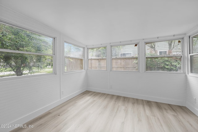 unfurnished sunroom with a healthy amount of sunlight