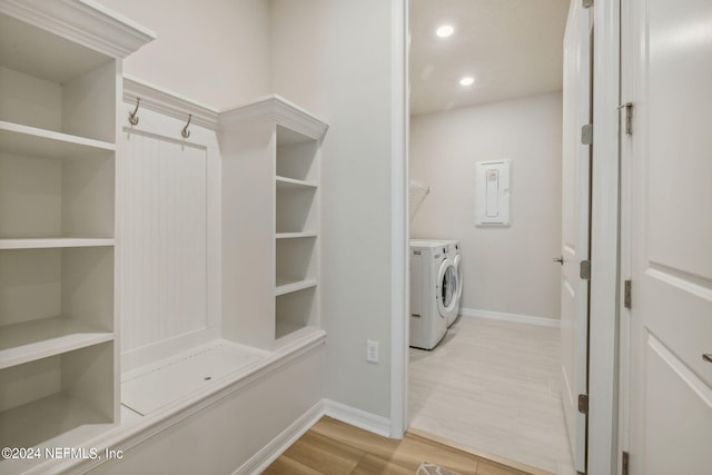 laundry area featuring recessed lighting, laundry area, separate washer and dryer, baseboards, and light wood-style floors