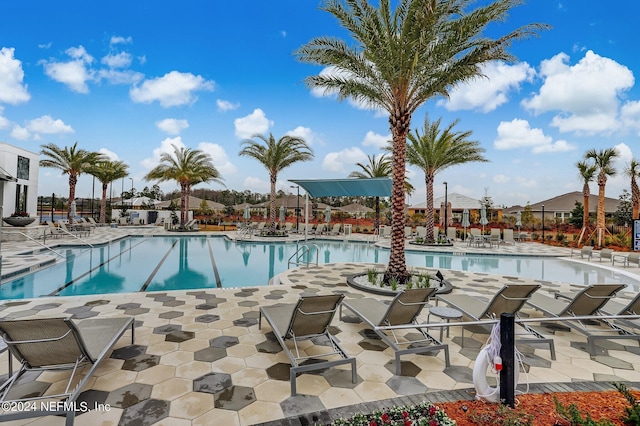 pool with a patio area