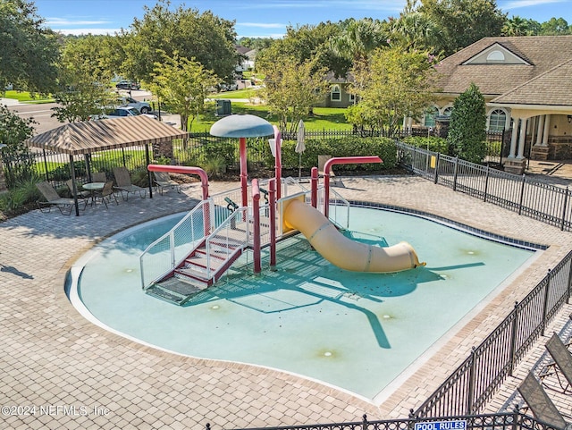 view of pool featuring a patio area