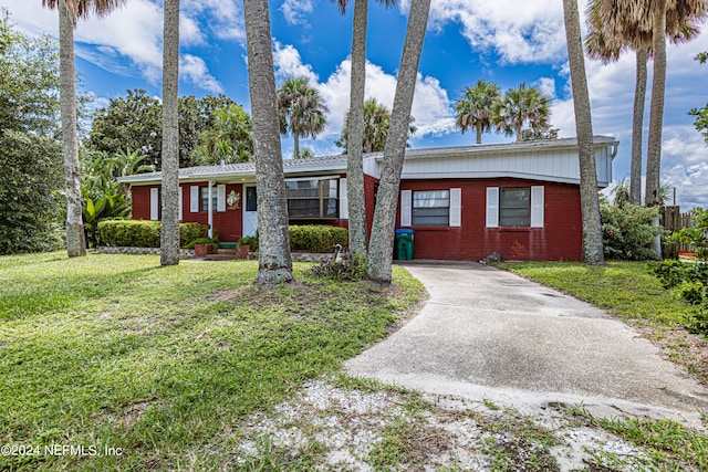 ranch-style house with a front yard