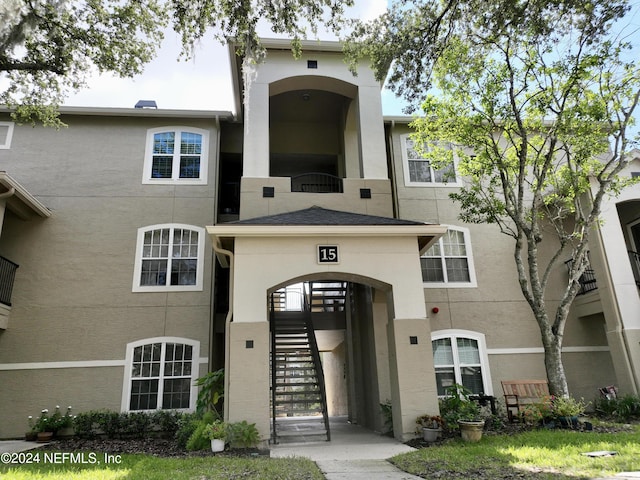 view of property with stairs