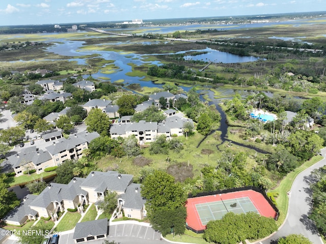 bird's eye view featuring a water view and a residential view