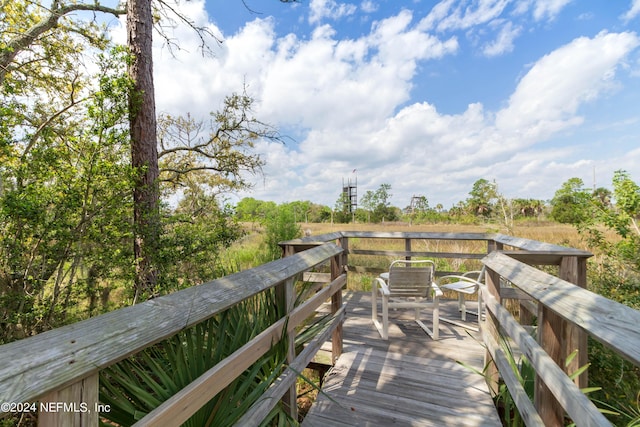 surrounding community with a deck