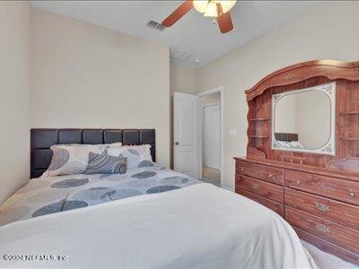 bedroom featuring ceiling fan