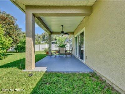 view of patio / terrace featuring ceiling fan