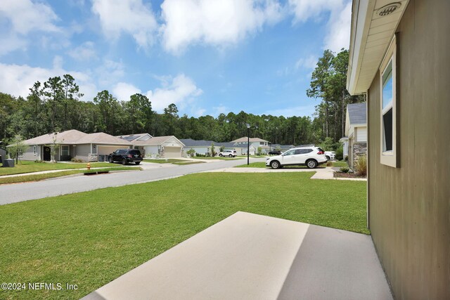 view of yard featuring a garage