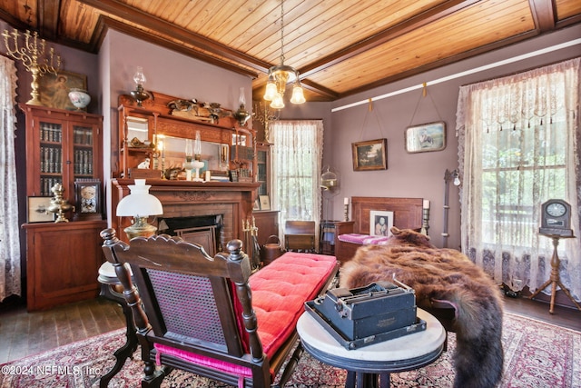 living room featuring wooden ceiling, dark hardwood / wood-style floors, and ceiling fan