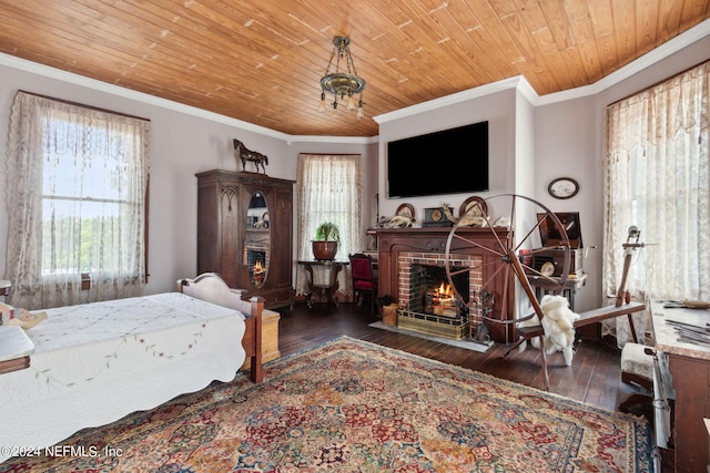 bedroom with a brick fireplace, dark wood-type flooring, ornamental molding, and wood ceiling