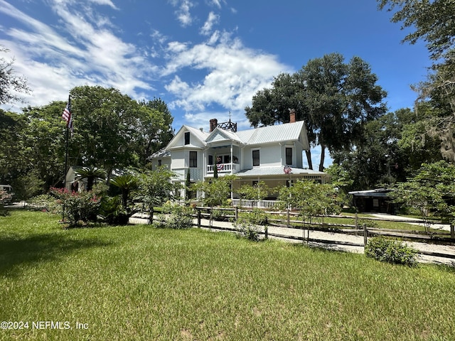 view of front of home with a front yard