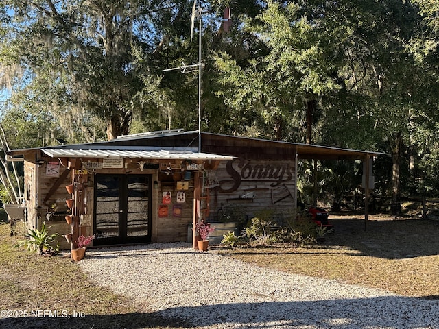 exterior space with an outbuilding