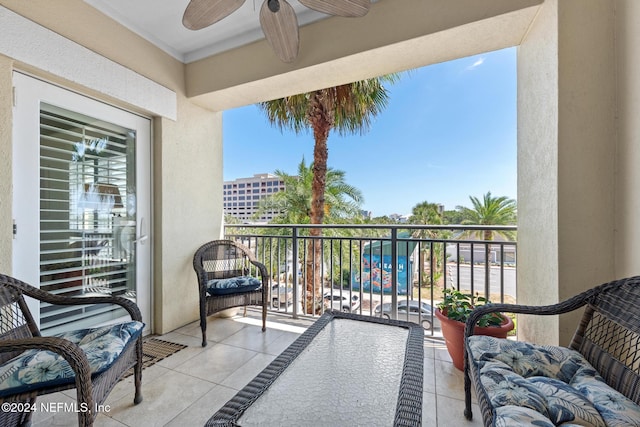 balcony featuring ceiling fan