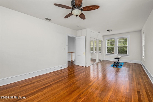 unfurnished bedroom featuring ceiling fan and wood-type flooring