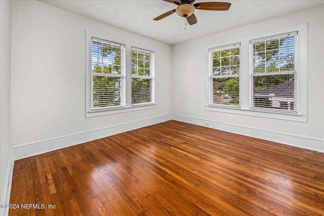 unfurnished room featuring hardwood / wood-style flooring and ceiling fan